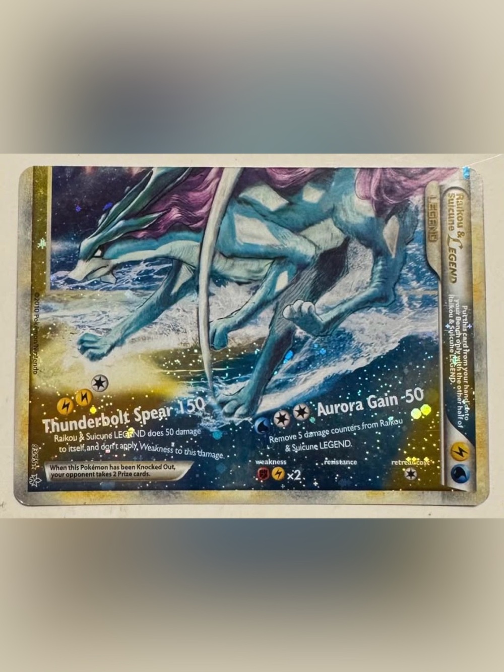 Pokémon Raikou & Suicune LEGEND Trading Card (bottom half)- Blue and Purple
